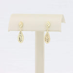 Load image into Gallery viewer, Stylish gold teardrop earrings with a hammered finish, perfect for any elegant occasion.