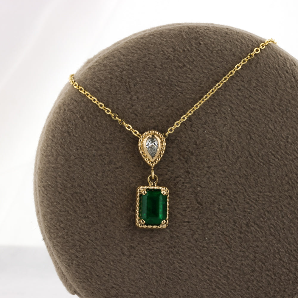 Emerald and Diamond Pendant in 14K Yellow Gold