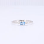 Load image into Gallery viewer, East-West Oval Aquamarine Ring with Diamond Trim in White Gold
