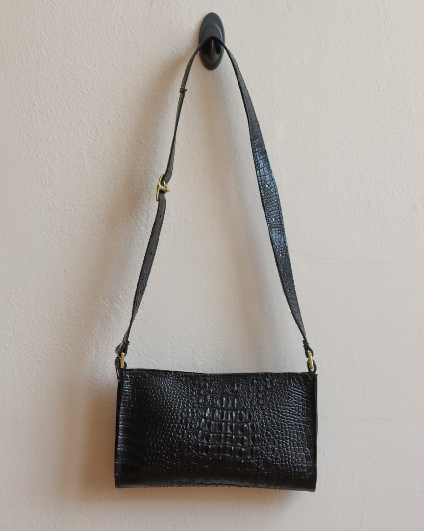 Black Alligator Vinyl Crossbody Bag with Adjustable Strap and Yellow Metal Hardware