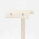 Load image into Gallery viewer, Swiss Blue Topaz Stud Earrings, 0.28cttw in 10K Yellow Gold - Kizer Cummings Jewelers