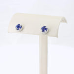 Load image into Gallery viewer, Sapphire blue stud earrings in sterling silver with intricate bead detailing, perfect for elegant occasions.