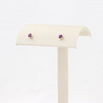 Load image into Gallery viewer, Amethyst stud earrings in 10K yellow gold, 0.20cttw, pair