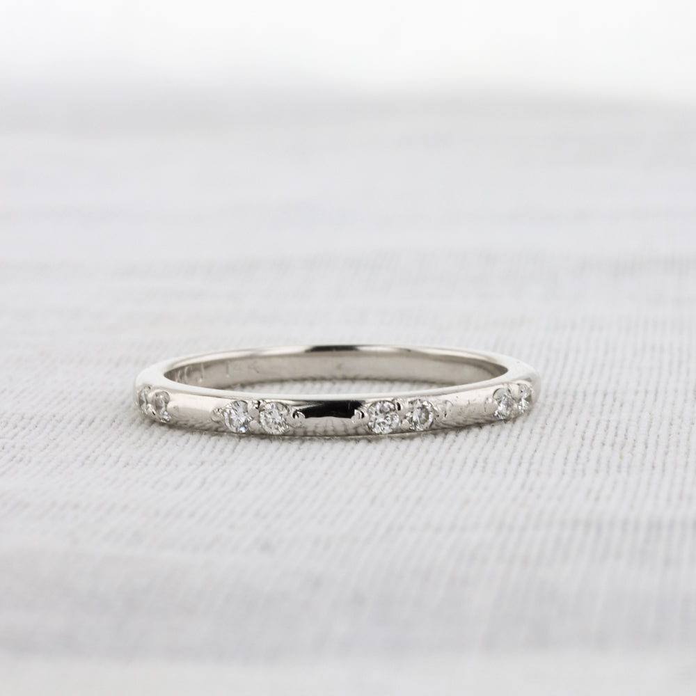 Spaced Diamond Band in White Gold