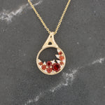 Load image into Gallery viewer, Garnet and Diamond Cluster Circle Pendant, 0.50cttw Garnet with 0.04cttw Diamond in 14K Yellow Gold, 18 inch Chain