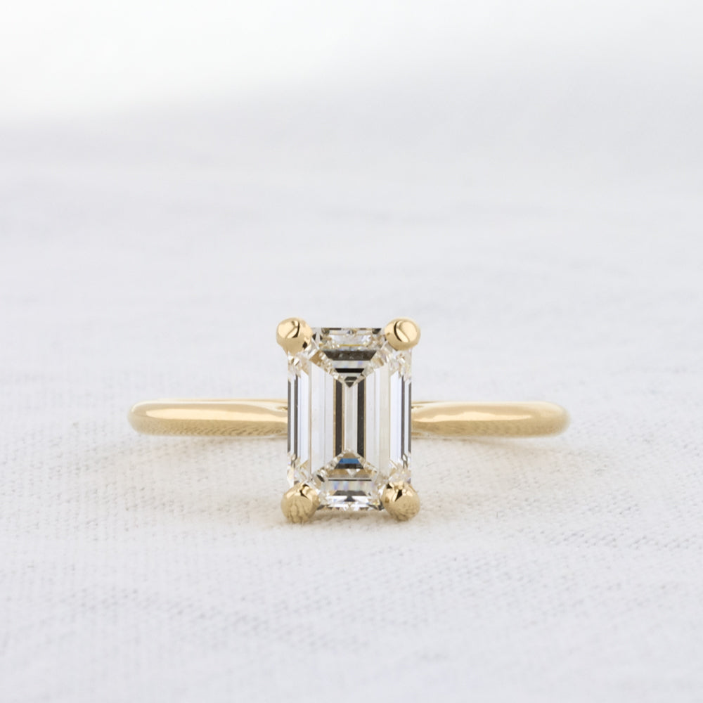 Emerald Cut Diamond Solitaire Ring in Yellow Gold