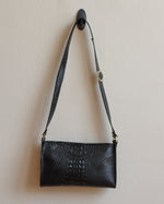 Load image into Gallery viewer, Crossbody bag by Bespoke Leather Designs, black alligator-embossed vinyl with adjustable strap and yellow hardware