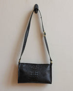 Load image into Gallery viewer, Black Alligator Vinyl Crossbody Bag with Adjustable Strap and Yellow Metal Hardware - Kizer Cummings Jewelers