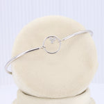 Load image into Gallery viewer, Articulated Bangle Bracelet With Diamonds Circle Center in White Gold