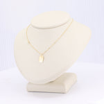 Load image into Gallery viewer, Yellow Gold Mini "Love" Tag Necklace with Adjustable 16-18" Chain