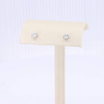 Load image into Gallery viewer, Classic silver stud earrings with brilliant cubic zirconia stones, perfect for elegant everyday wear.