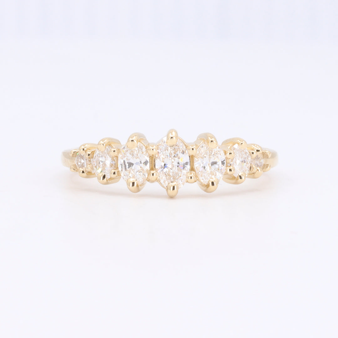 Seven Stone Graduating Oval Diamond Anniversary Ring in Yellow Gold