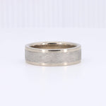 Load image into Gallery viewer, Silver textured men's ring with a polished edge, featuring a contemporary design. Perfect for everyday wear.