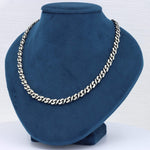 Load image into Gallery viewer, Sterling silver curb chain necklace on a blue velvet display bust, showcasing a sleek and modern style.