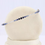 Load image into Gallery viewer, Diamond and Gradient Sapphire Bangle Bracelet, 0.33cttw Diamonds and 0.75cttw Sapphires in White Gold, 7 inch - Kizer Cummings Jewelers