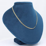 Load image into Gallery viewer, Elegant gold chain necklace displayed on a blue velvet bust, perfect for adding sophistication to any outfit.