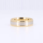 Load image into Gallery viewer, Two-tone gold and silver men's wedding band, featuring a sleek, modern design with polished finish.