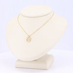 Load image into Gallery viewer, Star Set Diamond Circle Pendant on yellow gold chain, 18-inch length