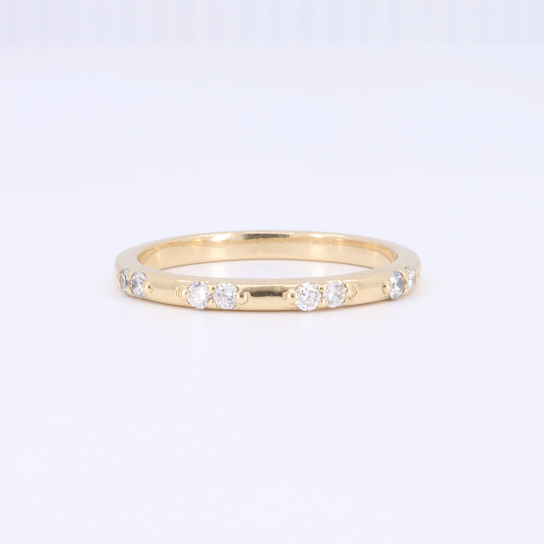 Spaced Diamond Wedding Band in Yellow Gold