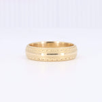 Load image into Gallery viewer, Gold textured wedding band with intricate detailing and a polished finish, perfect for timeless elegance.
