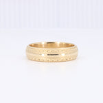 Load image into Gallery viewer, Elegant gold band ring with intricate textured patterns, perfect for formal occasions or everyday wear.
