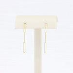 Load image into Gallery viewer, Gold paperclip dangle earrings, minimalist design, lightweight metal, perfect for everyday wear.