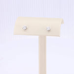 Load image into Gallery viewer, Elegant cubic zirconia stud earrings in silver, perfect for adding sparkle to any outfit.