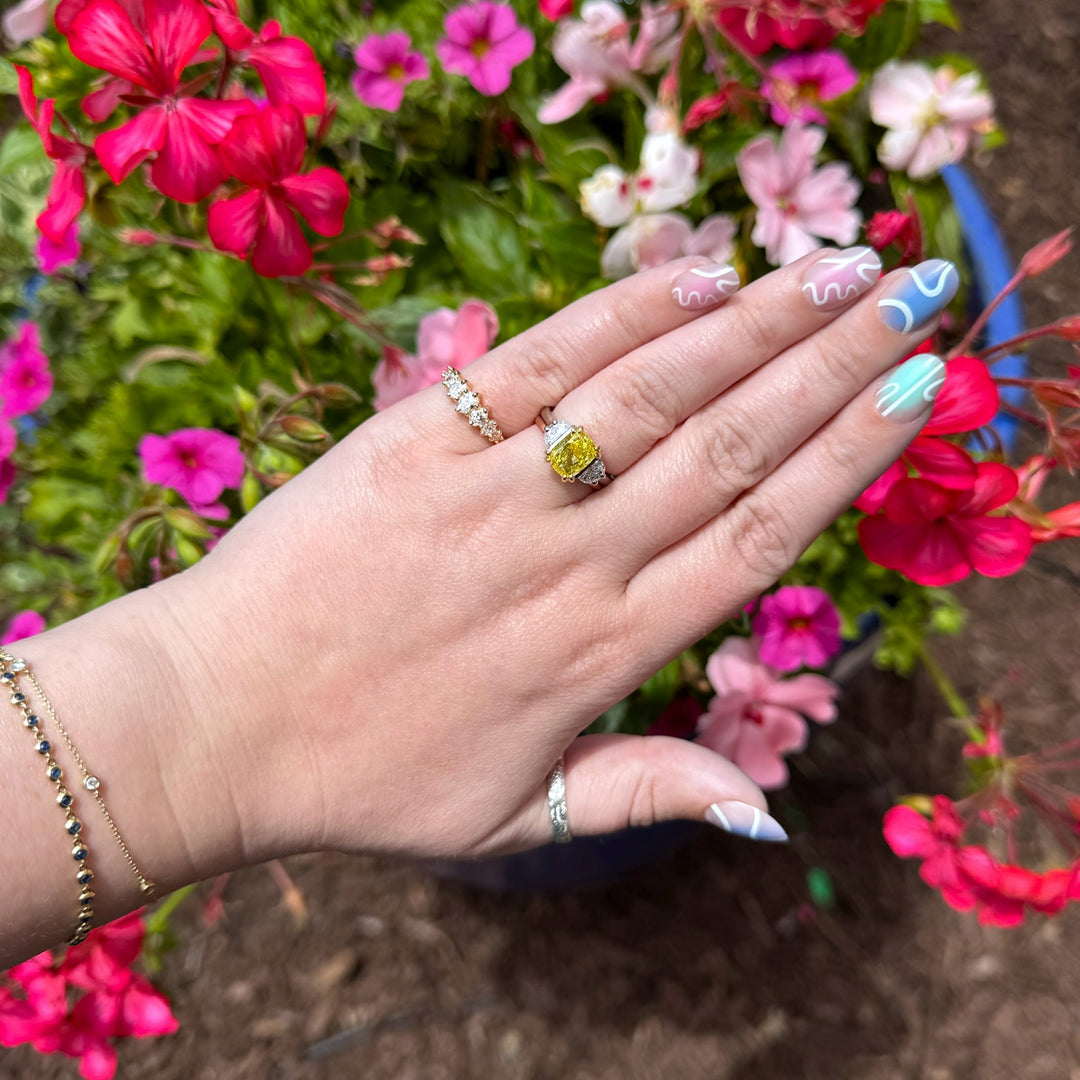 Seven Stone Graduating Oval Diamond Anniversary Ring in Yellow Gold