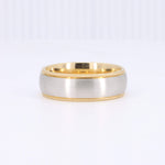 Load image into Gallery viewer, Brushed silver and polished gold men's wedding band with textured edges, elegant and modern design.