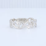 Load image into Gallery viewer, Sterling silver filigree band ring with intricate swirls and elegant design. Perfect for everyday wear or special occasions.