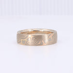 Load image into Gallery viewer, Men's bronze ring with intricate wave pattern, featuring a polished finish and a modern, stylish design.