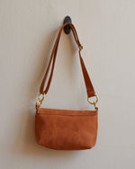 Load image into Gallery viewer, Tan Leather Crossbody Bag with Adjustable Strap and Brass Hardware
