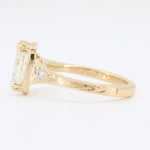Load image into Gallery viewer, Elegant gold ring featuring a large rectangular gemstone and a delicate diamond accent, perfect for special occasions.