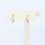 Load image into Gallery viewer, Diamond Huggie Earrings, 0.21cttw in 14K White Gold - Kizer Cummings Jewelers