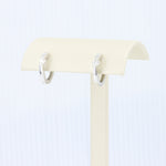 Load image into Gallery viewer, Half Bezel Diamond Huggie Earrings in White Gold