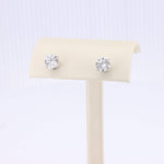 Load image into Gallery viewer, Elegant silver stud earrings with dazzling round cubic zirconia, perfect for any occasion.