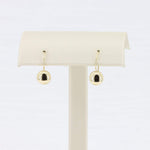 Load image into Gallery viewer, Gold-tone hoop earrings with black stone accents, featuring a modern and elegant design. Perfect for everyday wear.