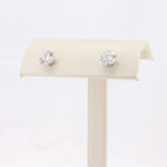 Load image into Gallery viewer, Sparkling round cut diamond stud earrings in white gold setting, perfect for elegant occasions.