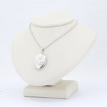 Load image into Gallery viewer, Floral Embossed Oval Locket in Sterling Silver, 18 inch Chain