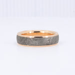Load image into Gallery viewer, Men's sterling silver damascus steel ring with a polished gold band, showcasing a unique wood grain design.