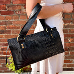 Load image into Gallery viewer, Black alligator vinyl shoulder purse with brass hardware and two top handles.