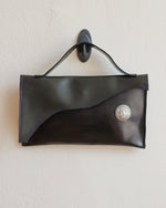 Load image into Gallery viewer, Glossy Black Leather Asymmetrical Clutch Bag with White Metal Hardware
