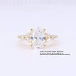 Load image into Gallery viewer, Gold ring setting with cubic zirconia, featuring an oval center stone and two side stones for a classic look.