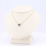 Load image into Gallery viewer, Sapphire Emerald Cut East West Necklace, 1.00ct in 14K Yellow Gold, 18 inch - Kizer Cummings Jewelers