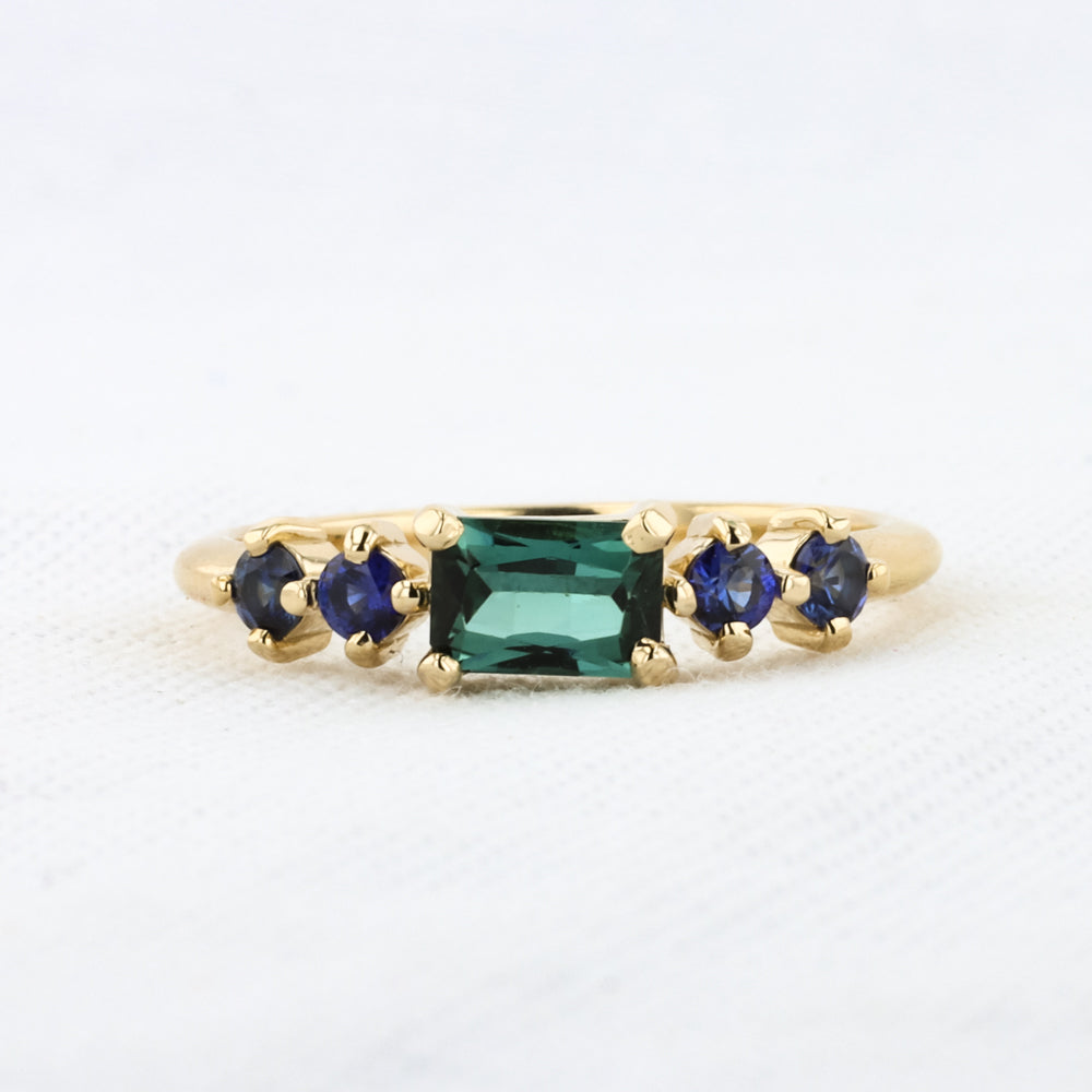 East-West Emerald-Cut Tourmaline and Sapphire Ring in Yellow Gold