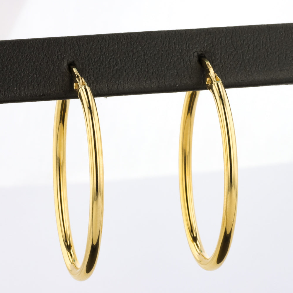 Elongated Oval Hoop Earrings in Yellow Gold