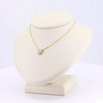 Load image into Gallery viewer, Gold chain necklace with an opal pendant, featuring a delicate starburst design. Elegant and modern style.