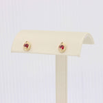 Load image into Gallery viewer, Ruby Teardrop Stud Earrings, 0.26cttw in 14K Yellow Gold - Kizer Cummings Jewelers