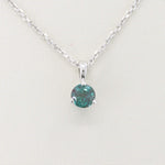 Load image into Gallery viewer, Sterling silver necklace featuring a round teal gemstone pendant, elegantly hung on a delicate chain.
