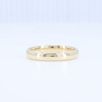 Load image into Gallery viewer, Polished yellow gold band ring, smooth, minimalist design, perfect for stacking or as a classic wedding band.
